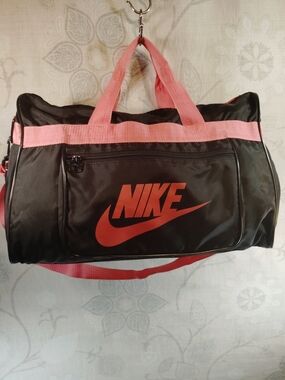 Nike Black Duffel Bag with Pink Accents